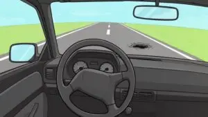 Car interior with road pothole ahead