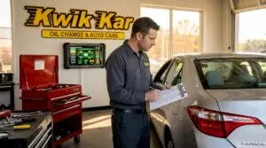 Inspector checks vehicle with checklist in auto garage