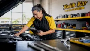 ASE-certified technician inspecting car engine