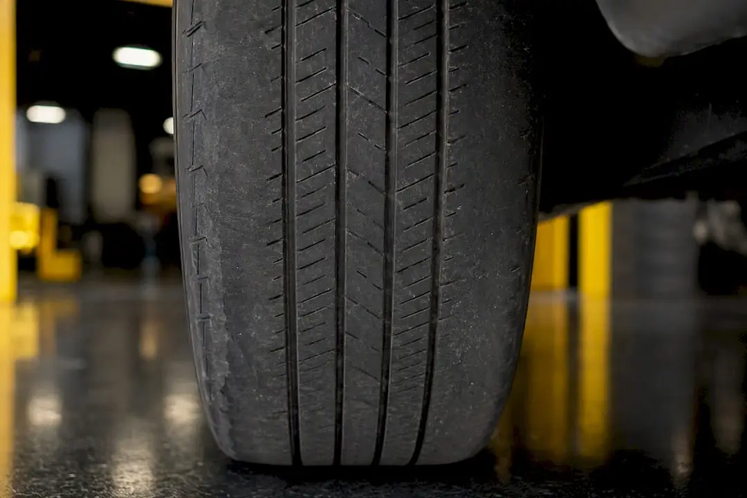 Close-up of tire with uneven tread wear