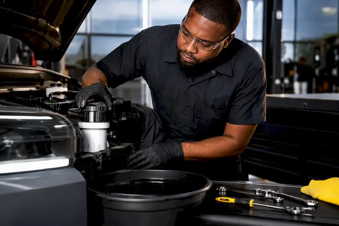 Technician performing fleet preventive maintenance